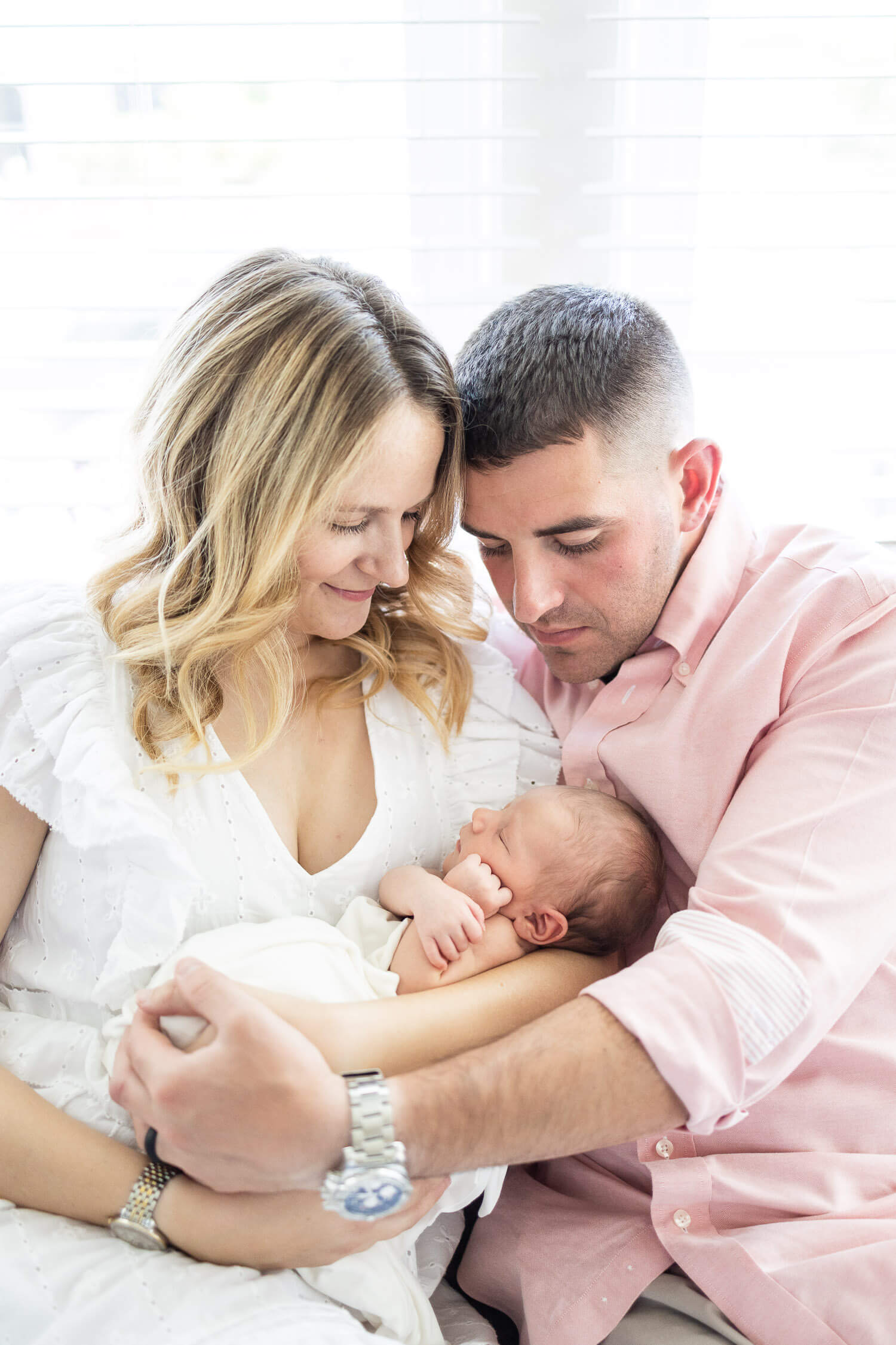 couple holding a newborn baby